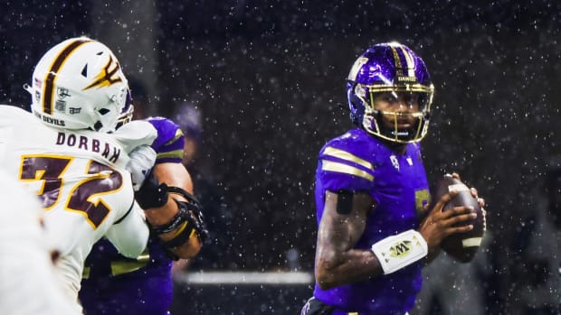 Washington Huskies quarterback Michael Penix Jr. (9) looks to pass against the Arizona State Sun Devils during the first quarter at Alaska Airlines Field at Husky Stadium.